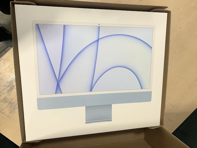 New Condition iMac inside original box.